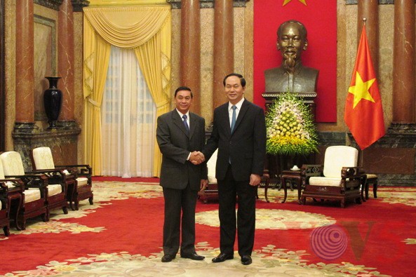 Staatspräsident Tran Dai Quang empfängt den Leiter des laotischen Staatspräsidentenbüros  - ảnh 1
